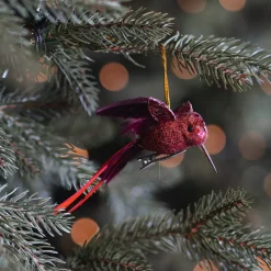 Deep Red Hummingbird With Stretched Wings