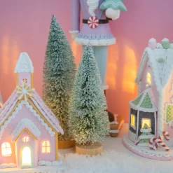 Green Christmas Tree On Wooden Base With Snow