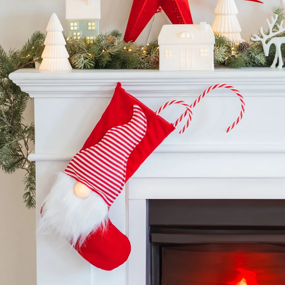Red Christmas Stocking Decorated With A Gnome